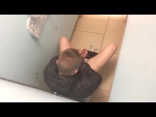 spying a masturbator in a jacket on the toilet